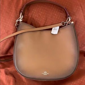 Gorgeous Coach Nomad purse. Brand new with tags!!